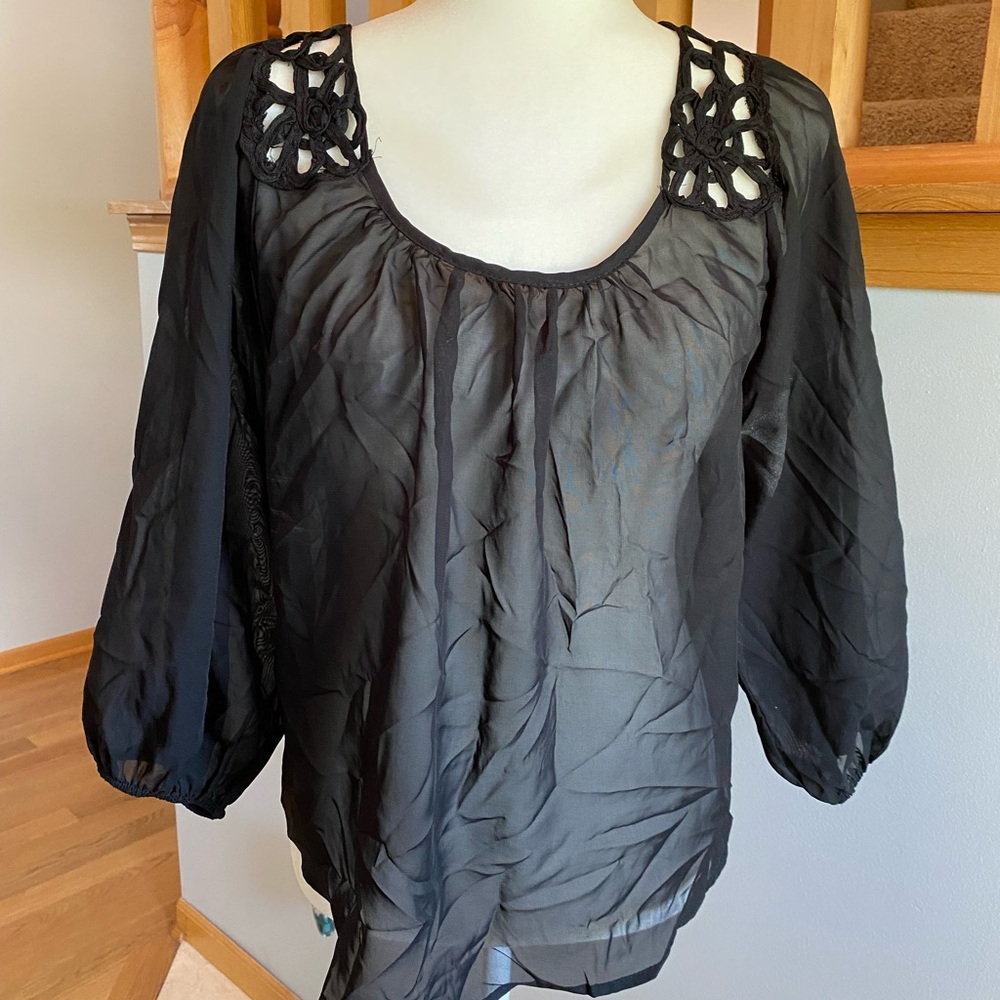 Elegant Black Blouse with Lace Shoulders